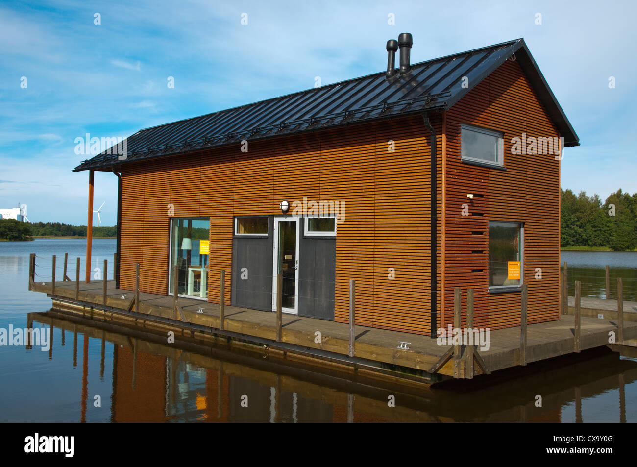 Floating ecological wooden house by the Baltic Sea in Reposaari island