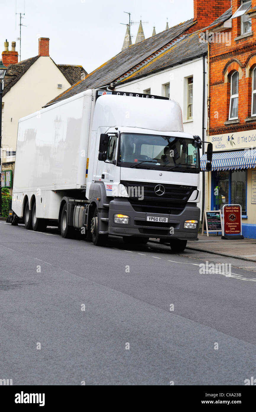 A Tesco delivery truck in the Village of Cricklade, Wiltshire. Stock Photo