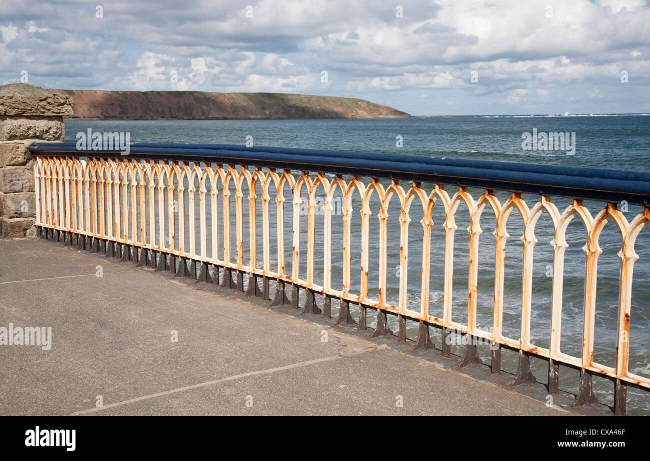 Rusted railings at seaside Stock Photo