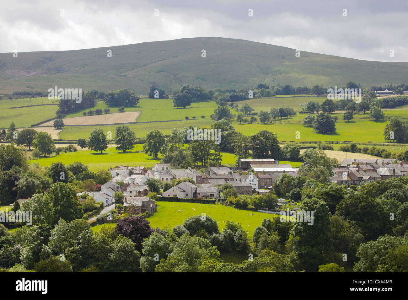Hesket Newmarket village below High Pike Fell, Cumbria, England ,UK