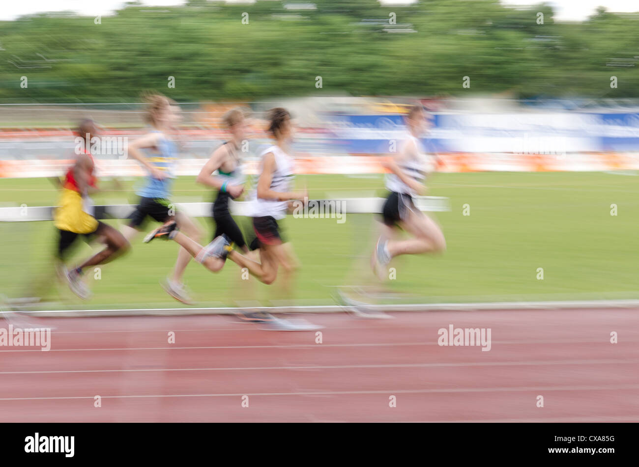 Blurred colourful motion and action of track and field events 100m