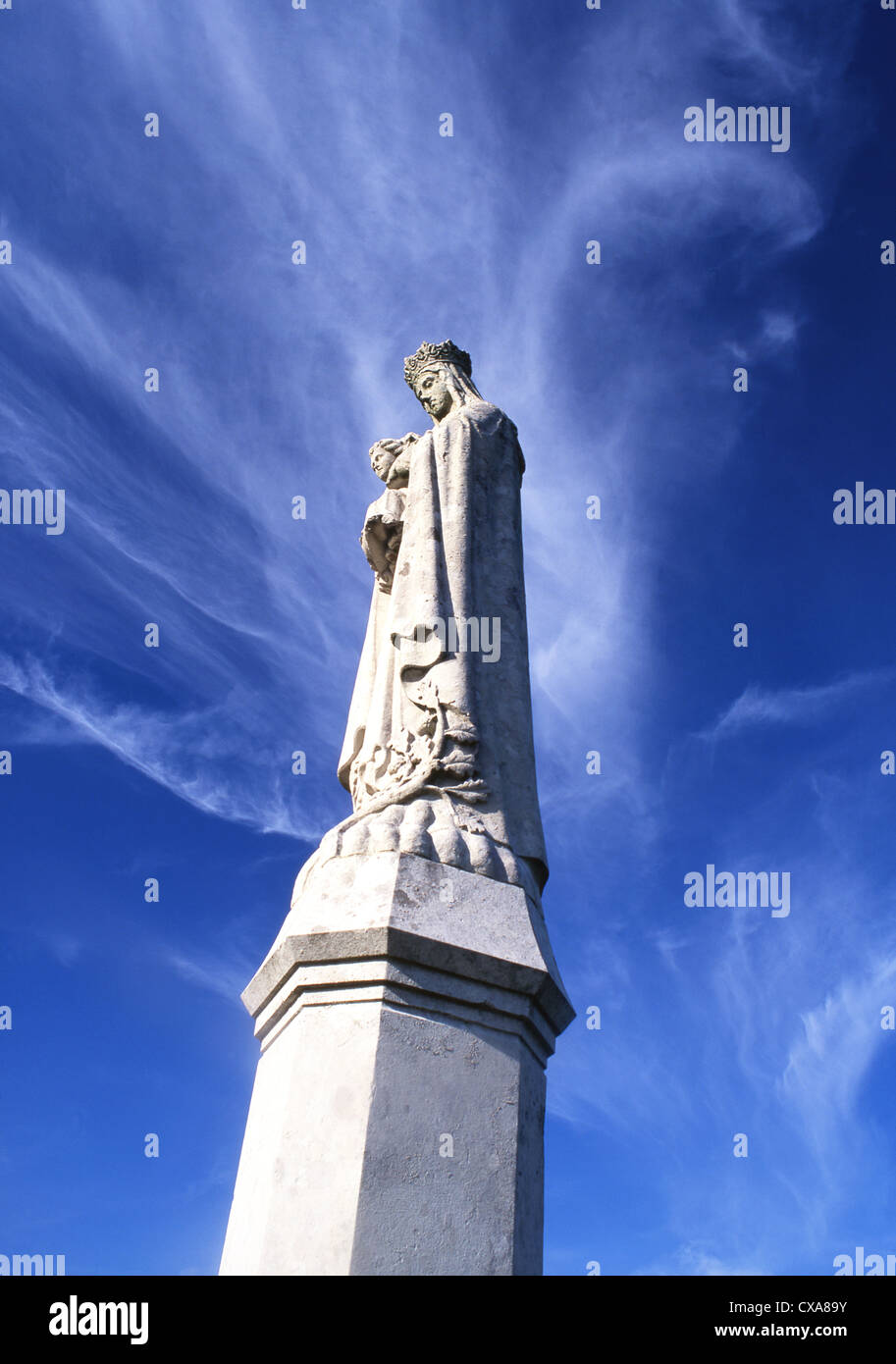 Statue of Our Lady of Penrhys with dramatic sky behind Roman Catholic pilgrimage site Rhondda Valley South Wales UK Stock Photo