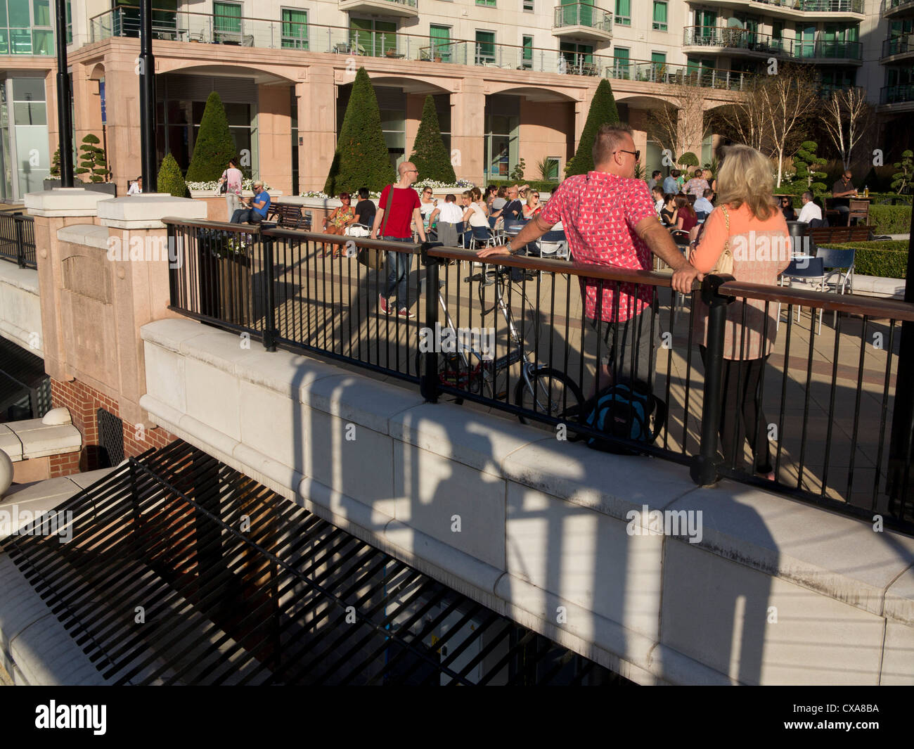 People enjoy Thames riverside pier development in Vauxhall, as part of the legacy of the London 2012 Olympic Games Stock Photo