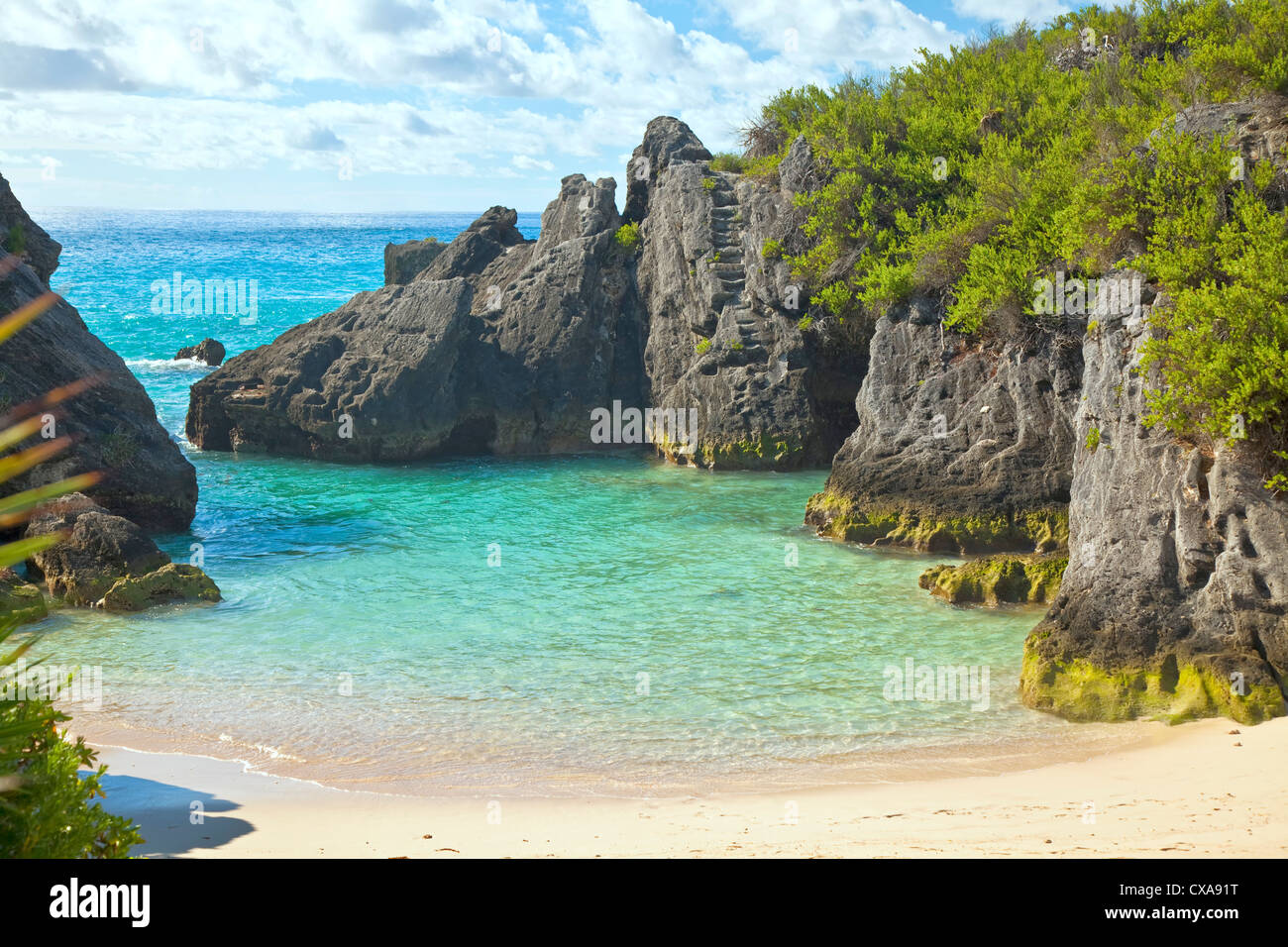 The beautiful secluded romantic Jobson Cove Beach on the south side of Bermuda. Stock Photo