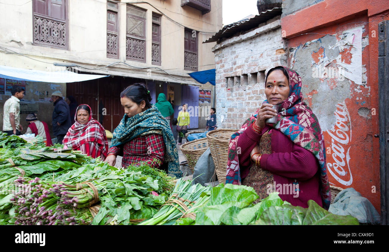 Nepali women selling green vegetables at a market in Kathmandu, Nepal