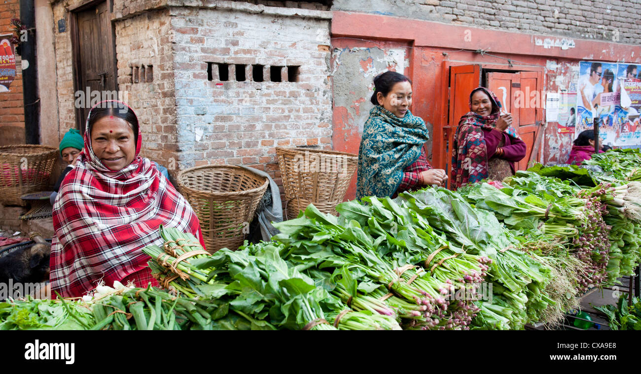Nepali women selling green vegetables at a market in Kathmandu, Nepal