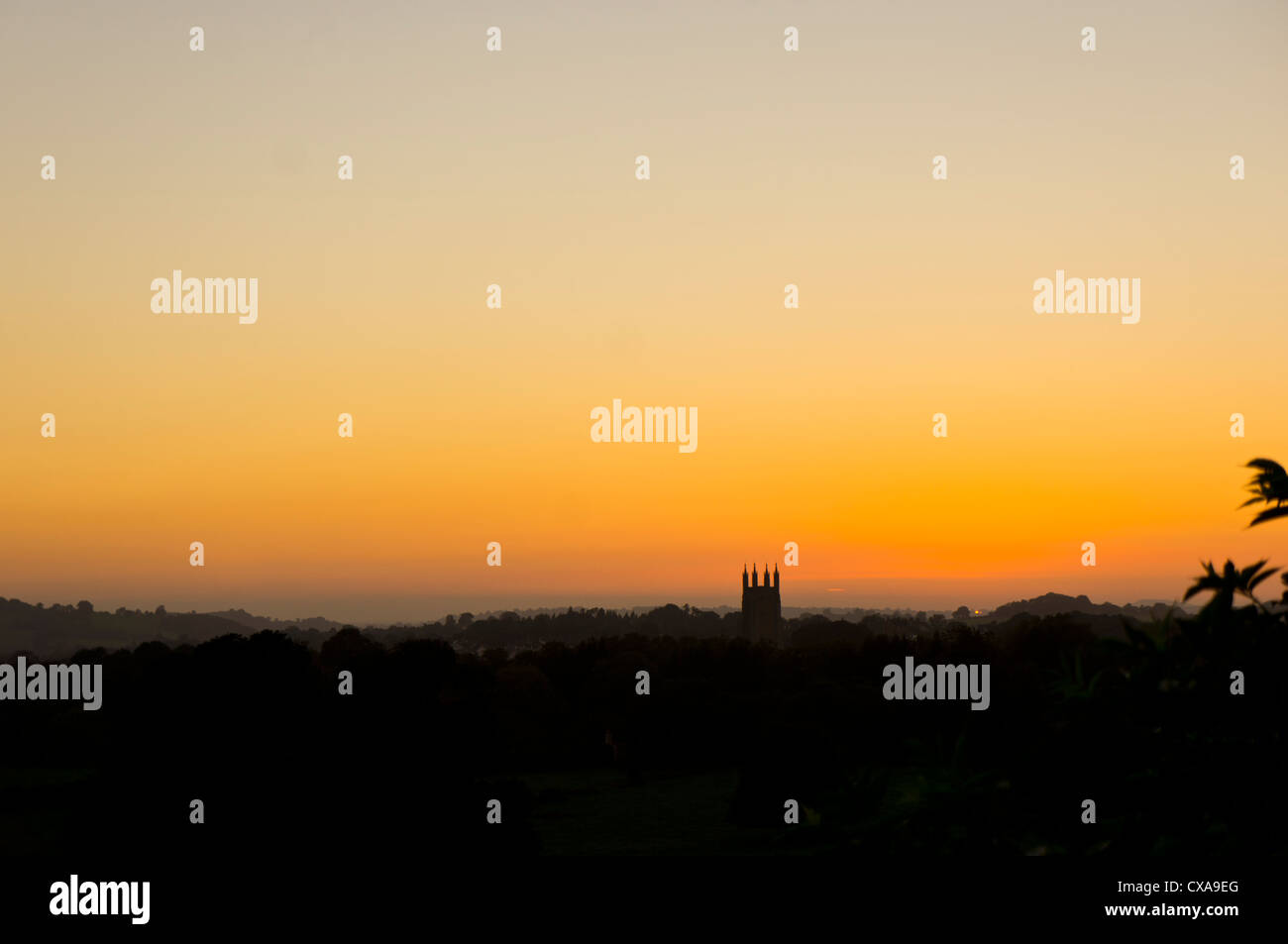 St Cuthbert's Church, Wells, Somerset seen from a distance at sunset. The church used for the village fete in the movie Hot Fuzz Stock Photo