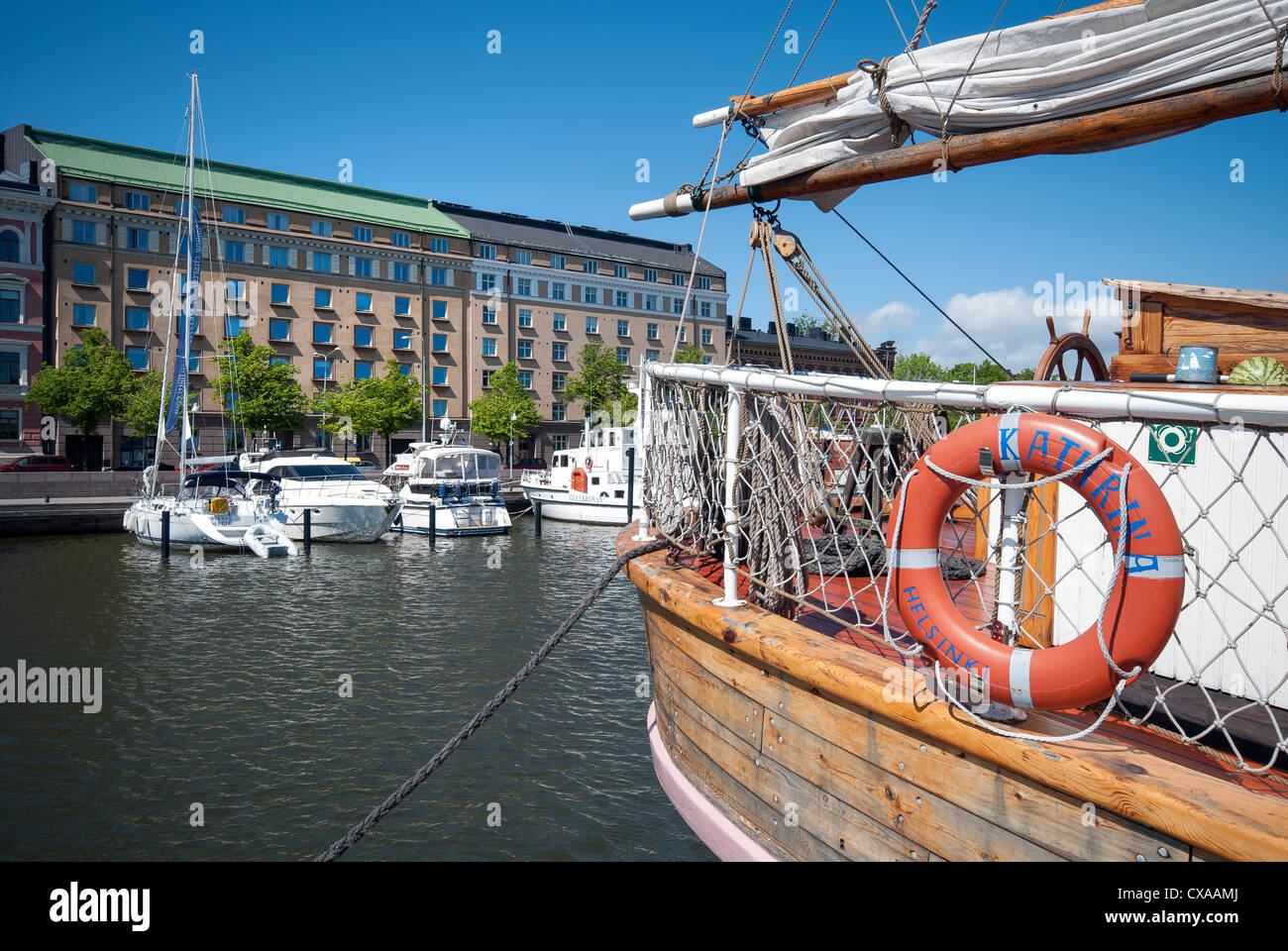 Boats moored on Halkolaituri Firewood Quay Helsinki. Located between Kauppatori and Tervasaari Stock Photo