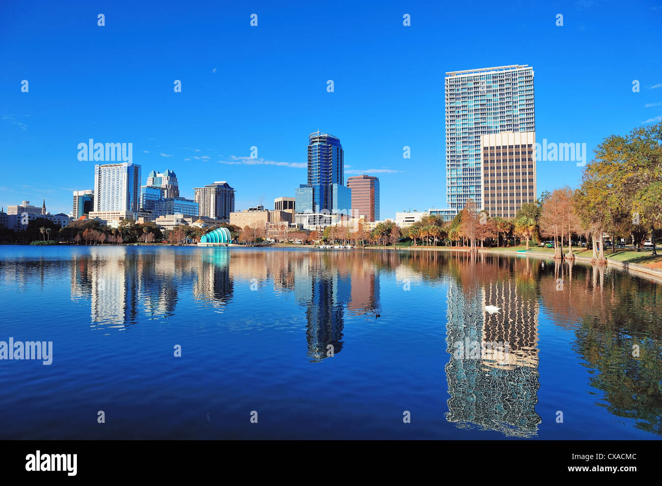 Orlando Lake Eola in the morning with urban skyscrapers and clear blue