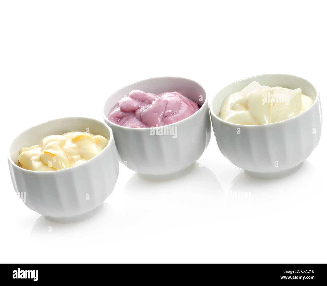 Fresh Yogurts Assortment In White Bowls Stock Photo Alamy