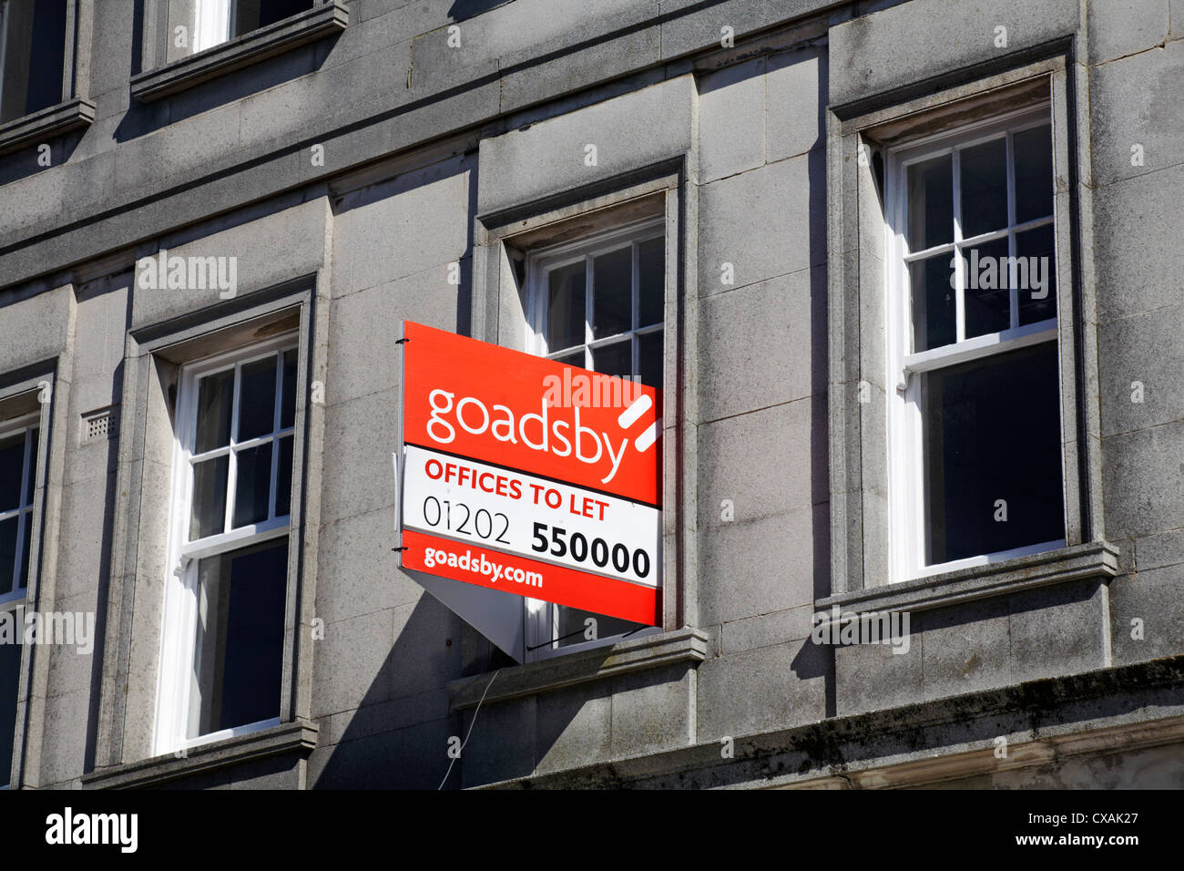 Offices to let sign on buildings at Bournemouth in September Stock