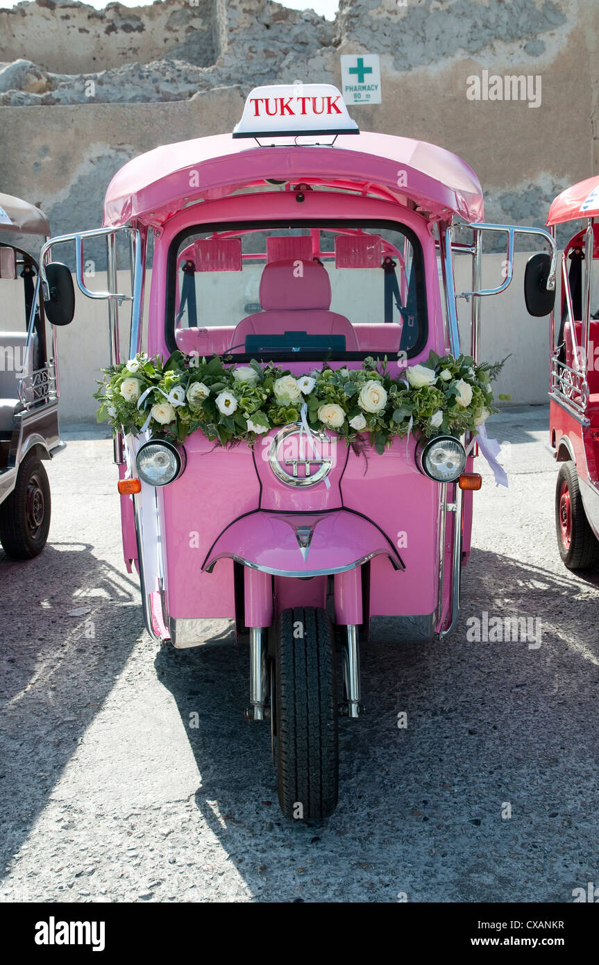 pink wedding tuk tuk motor vehicle, oia, santorini, greece Stock Photo