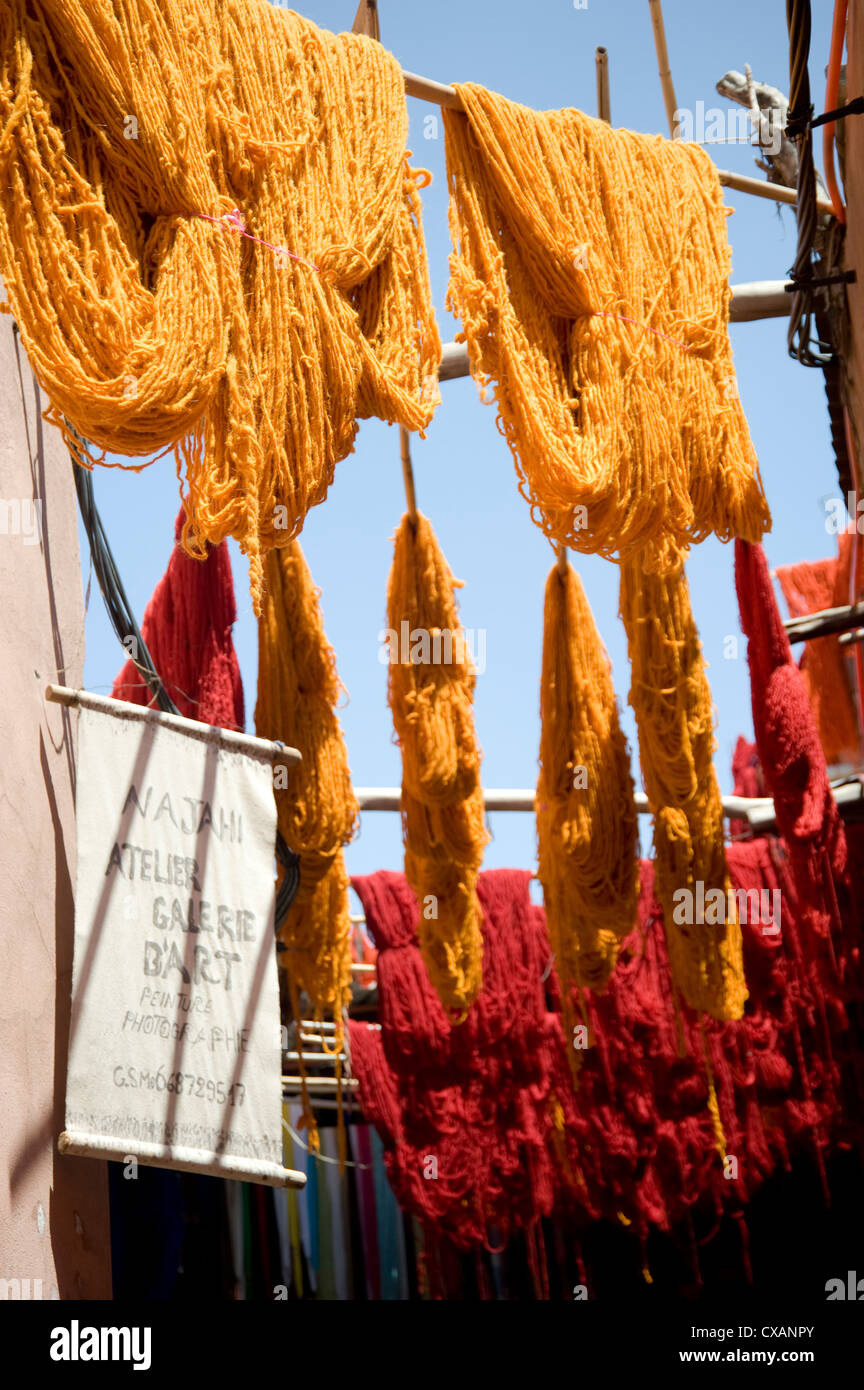 Brightly coloured wool hanging to dry in the dyers souk, Marrakech, Morocco, North Africa, Africa Stock Photo