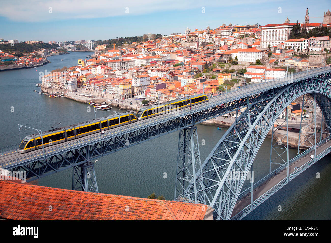 The Dom Luis 1 Bridge over the River Douro showing Metro light rail in transit and Arrabida Bridge in background, Porto (Oporto) Stock Photo