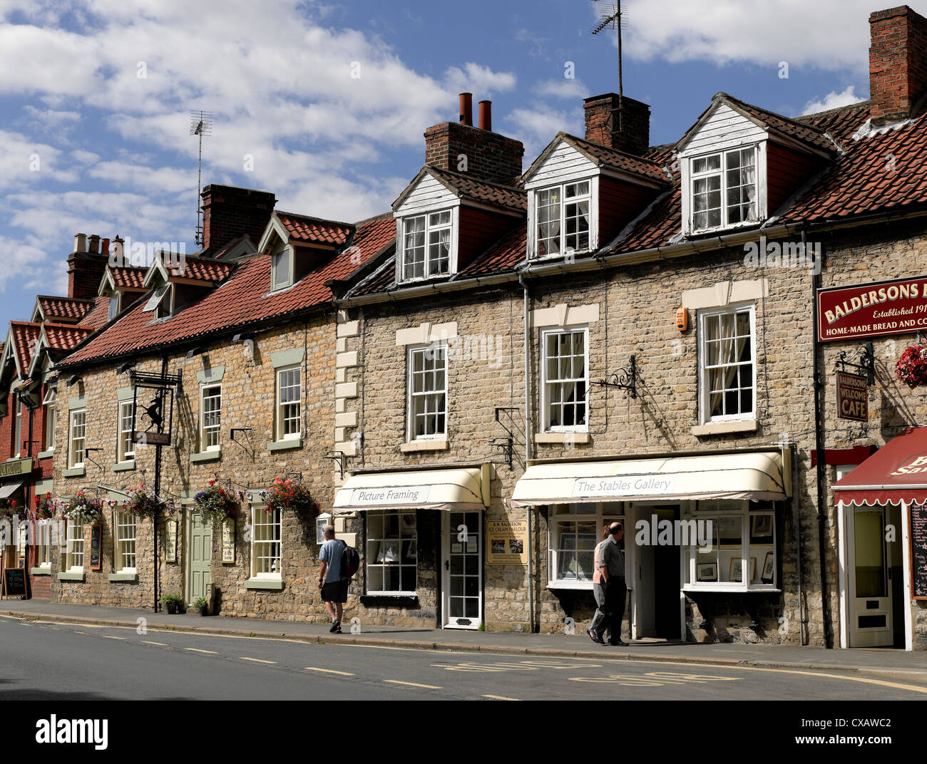 The Buck Hotel village pub and shops stores Thornton Le Dale North Yorkshire England UK United Kingdom GB Great Britain Stock Photo