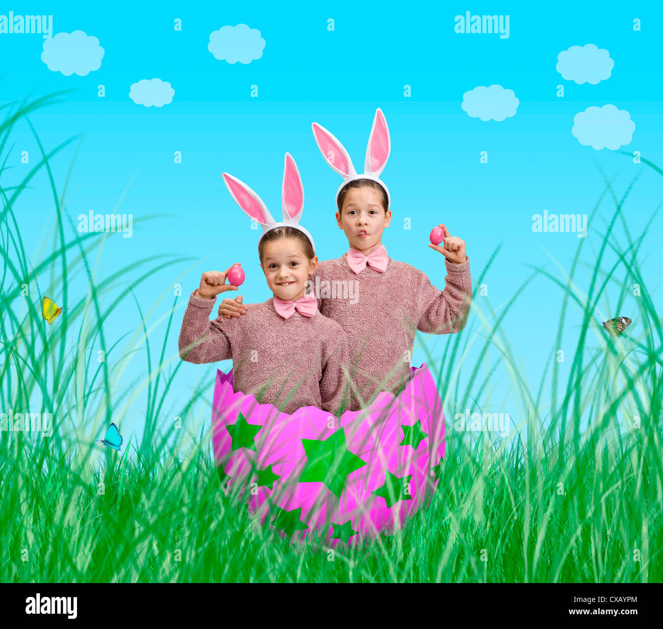 Riedlingen, two children with bunny ears and Easter eggs Stock Photo