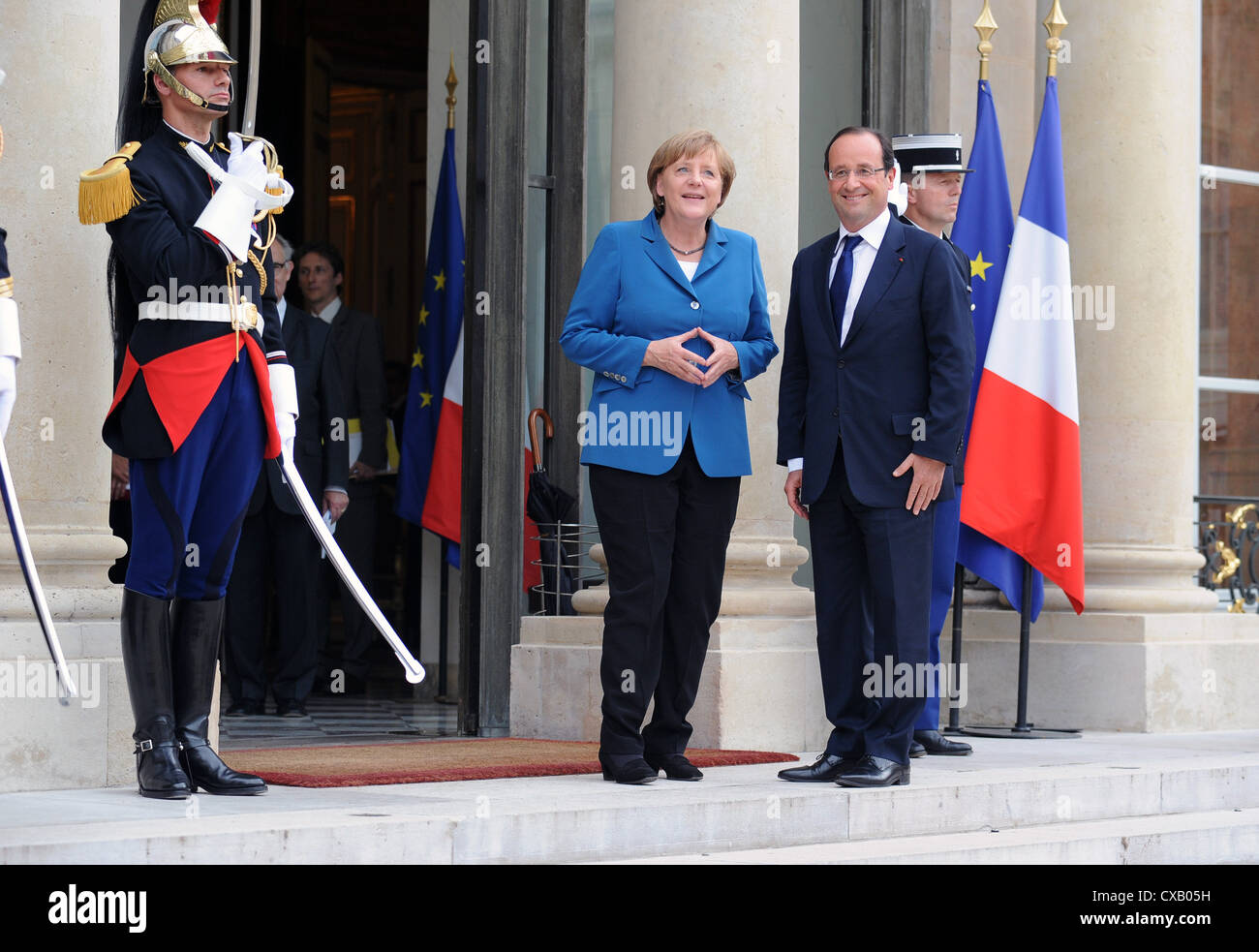 Meeting between French president Francois Hollande and german chancellor Angela Merkel at the Elysee palace in Paris, France. Stock Photo