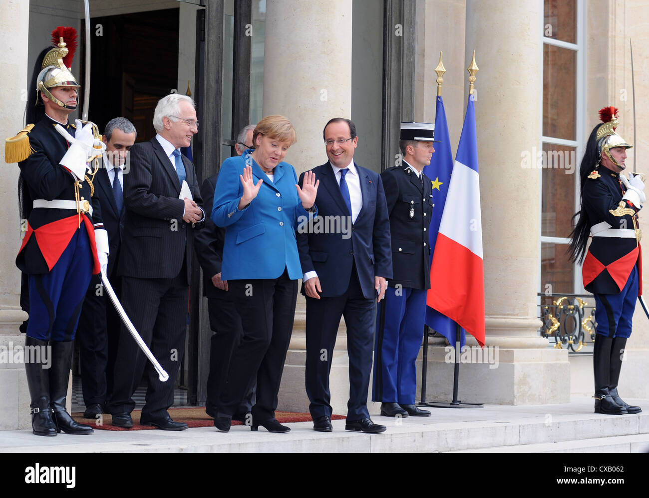 Meeting between French president Francois Hollande and german chancellor Angela Merkel at the Elysee palace in Paris, France. Stock Photo