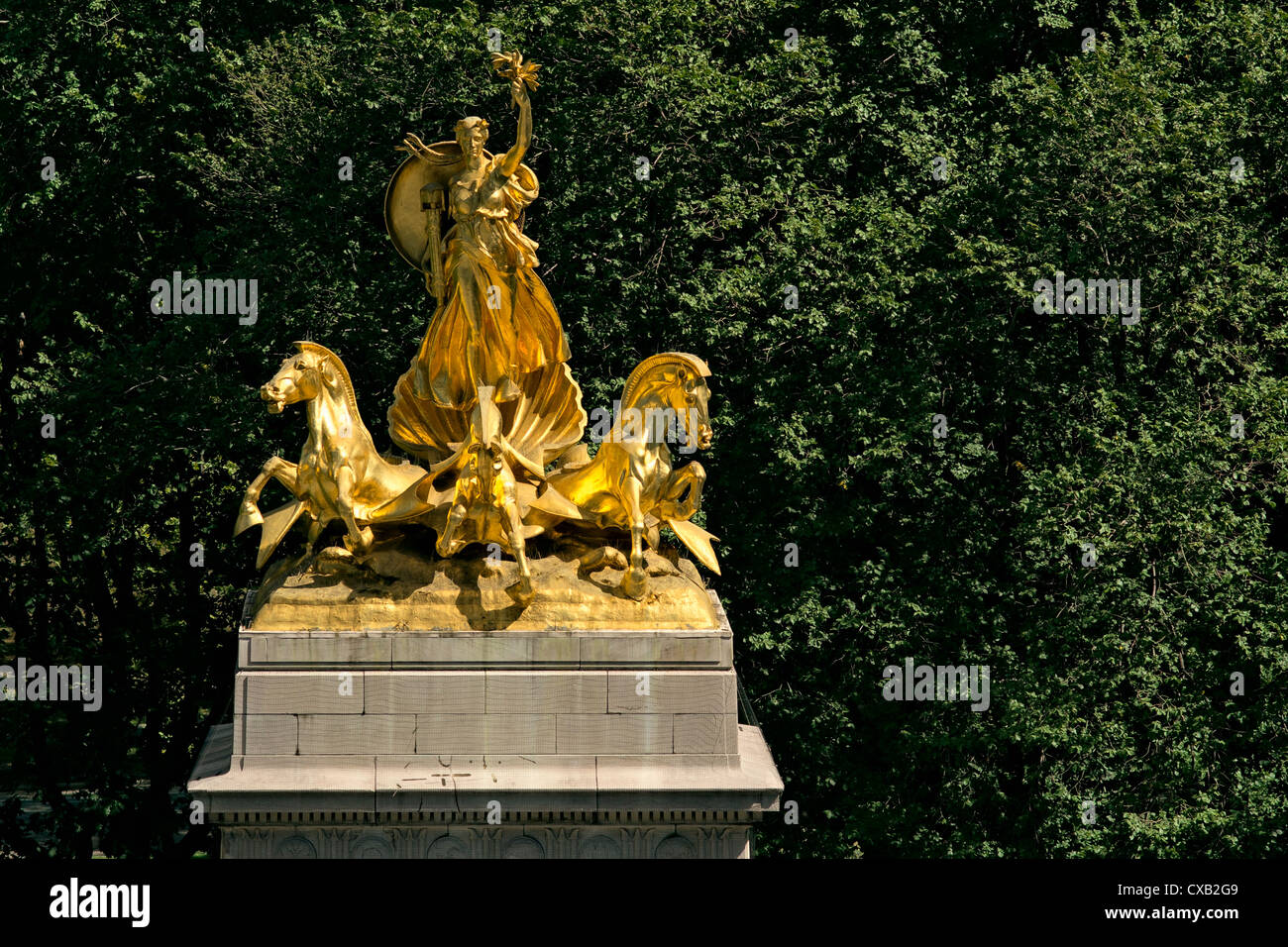 Gilded bronze statue atop USS Maine National Monument, south west entrance to Central Park, New York, NY, US Stock Photo