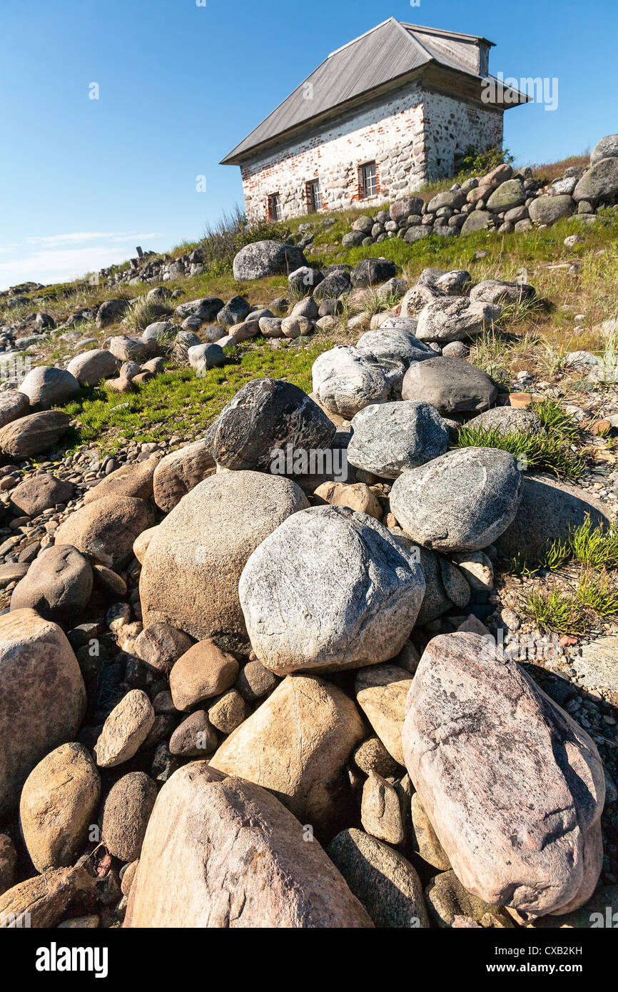 Stone house on the rocky shore. Bolshoi Zayatsky Island, Solovetsky Islands, The White Sea, Karelia, Russia. Stock Photo