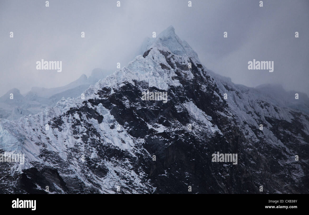 Frozen peak of a snowcapped mountain in Langtang National Park, Nepal Stock Photo