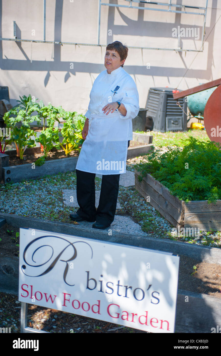 USA Indiana IN Indianapolis celebrity chef Regina Mehallick in her slow food garden at her restaurant R Bistro Stock Photo