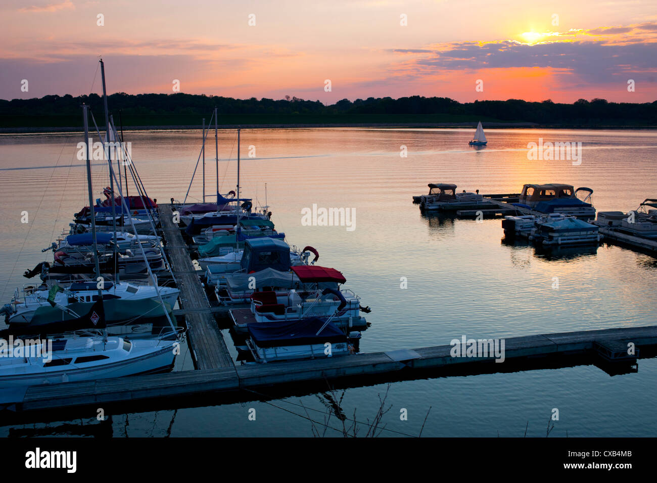 USA Indiana Indianapolis IN Boats on Eagle Creek Reservoir at sunset Stock Photo Alamy
