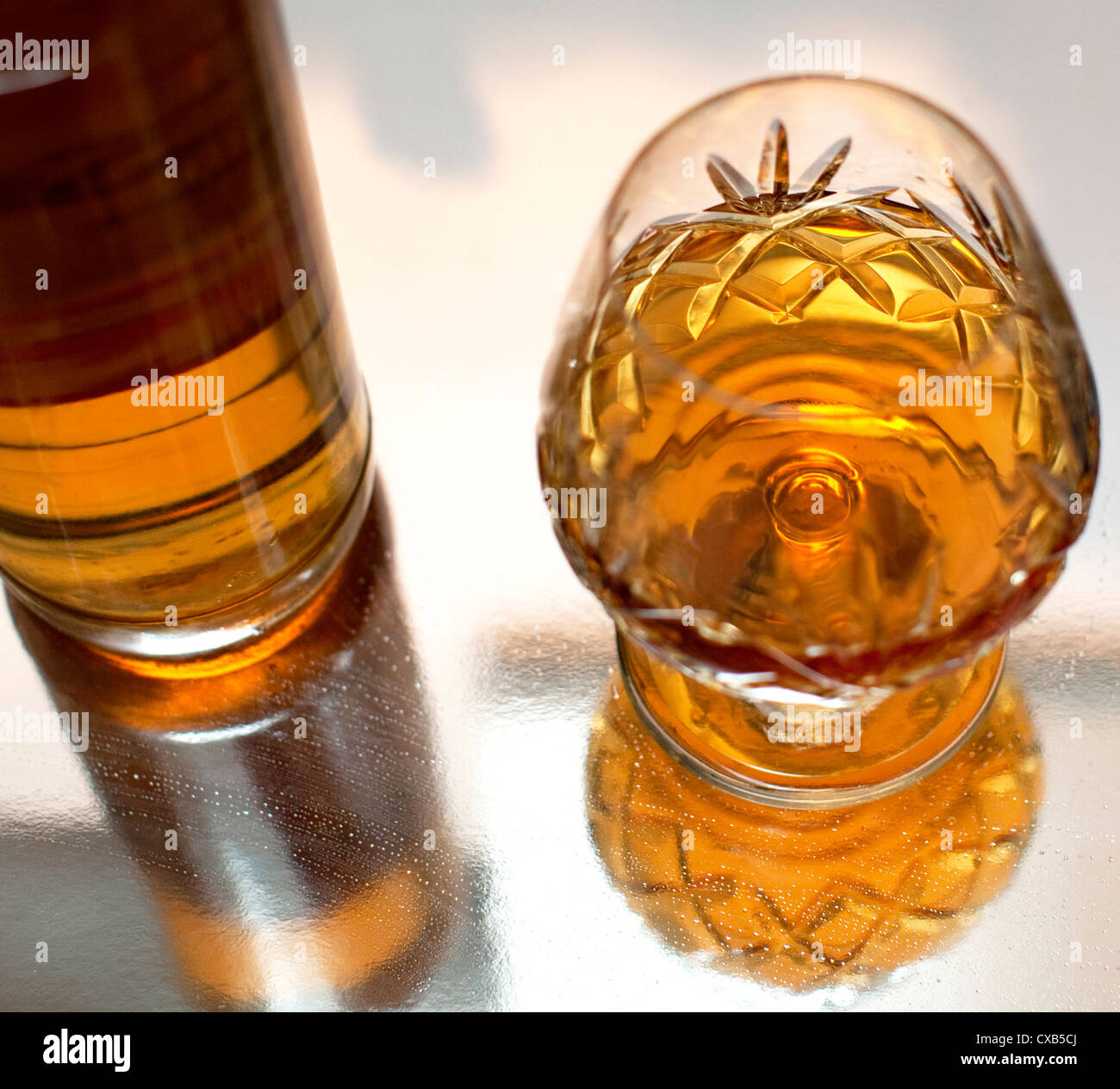 Glass and bottle of brandy, London Stock Photo Alamy