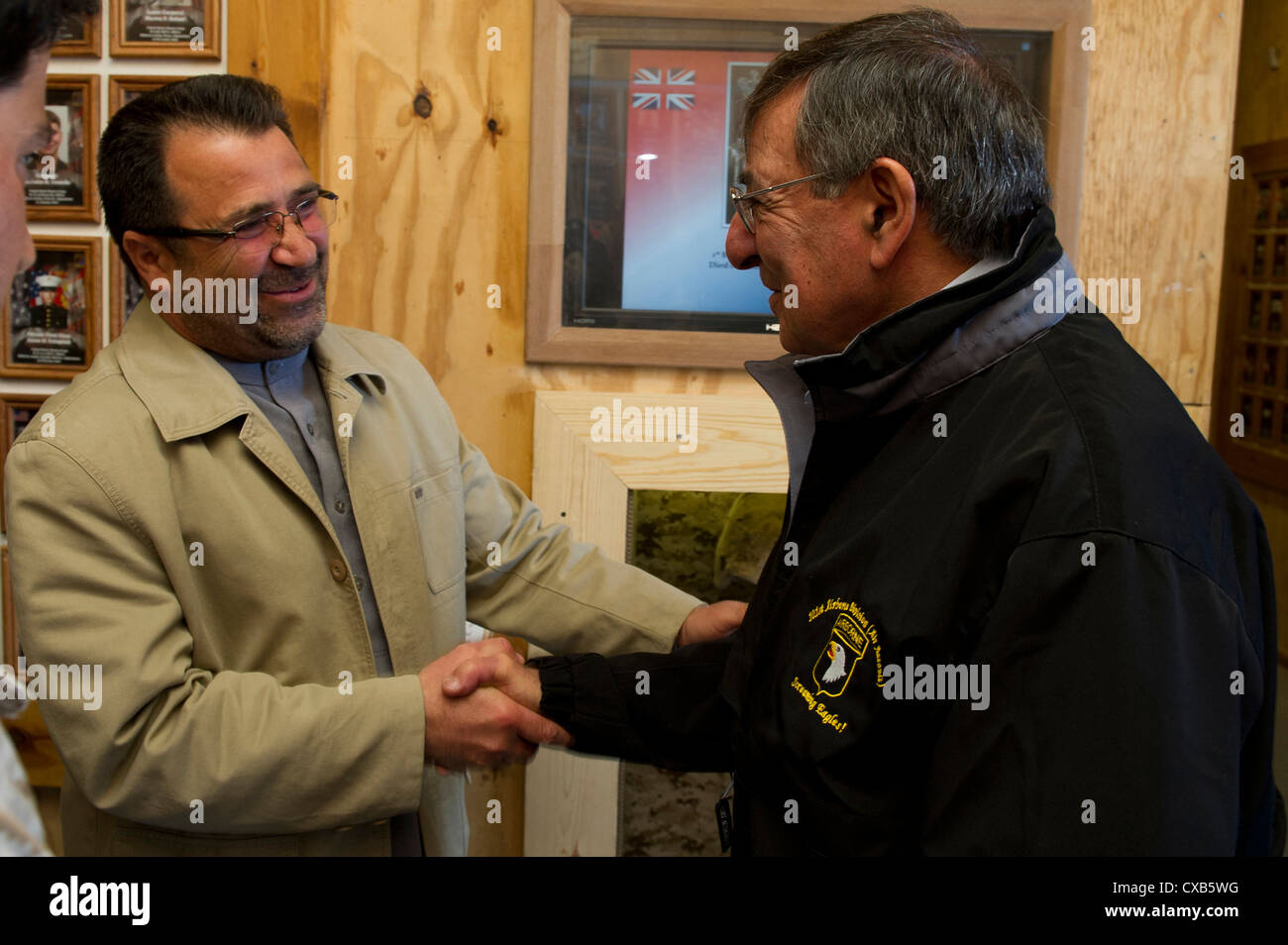 Helmand Provincial Governor Gulab Mangal welcomes Secretary of Defense Leon Panetta March 14, 2012 to Camp Bastion, Afghanistan. Panetta was on a four-day trip to Southwest Asia to meet with government leaders and visit US and coalition troops. Stock Photo