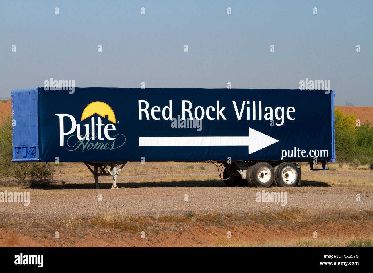 Trailer used as advertising billboard for Red Rock Village housing development in Pinal County, Arizona, USA. Stock Photo