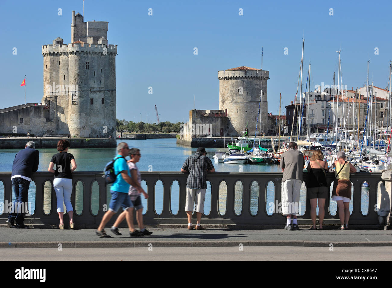 The towers tour de la Chaîne and tour Saint-Nicolas in the old harbour / Vieux-Port at La Rochelle, Charente-Maritime, France Stock Photo