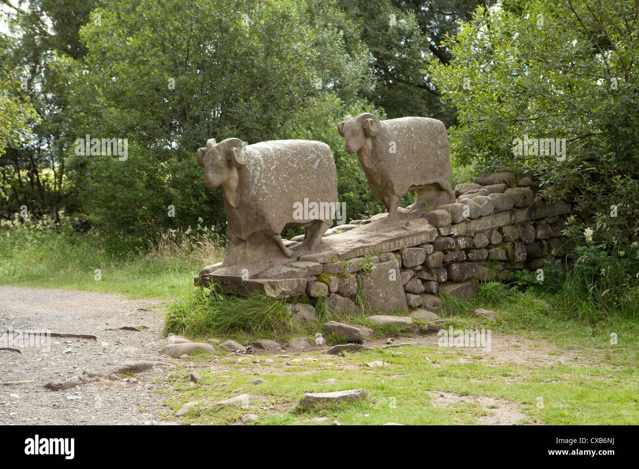 Statue of two sheep (Keith Alexander 2002) by the River Tees and Low Force waterfall in Teesdale, County Durham Stock Photo