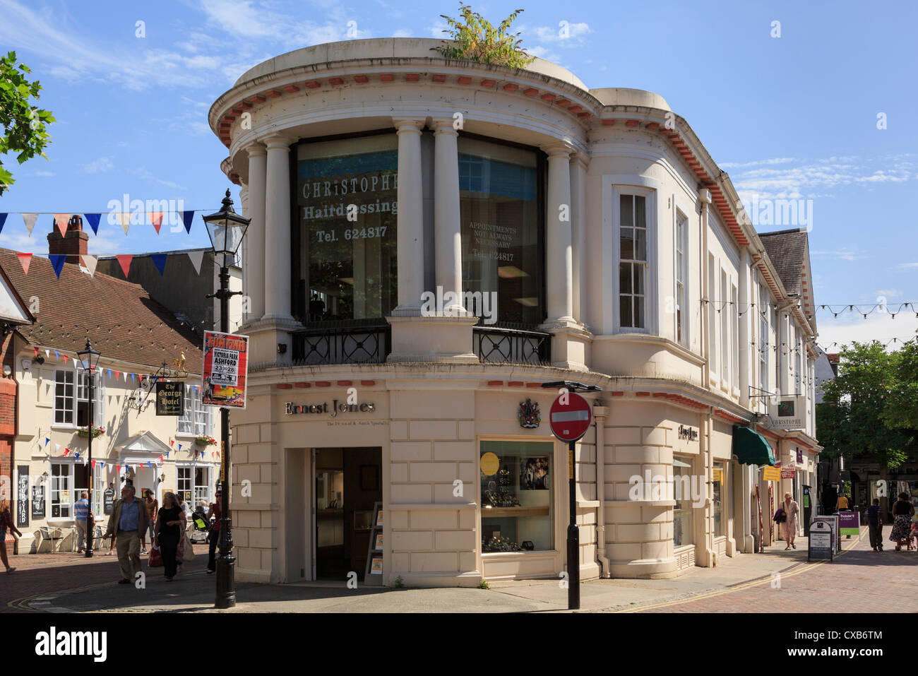 Street scene with Ernest Jones jewellers shop in the old town centre. Middle Row, High Street, Ashford, Kent, England, UK, Britain Stock Photo