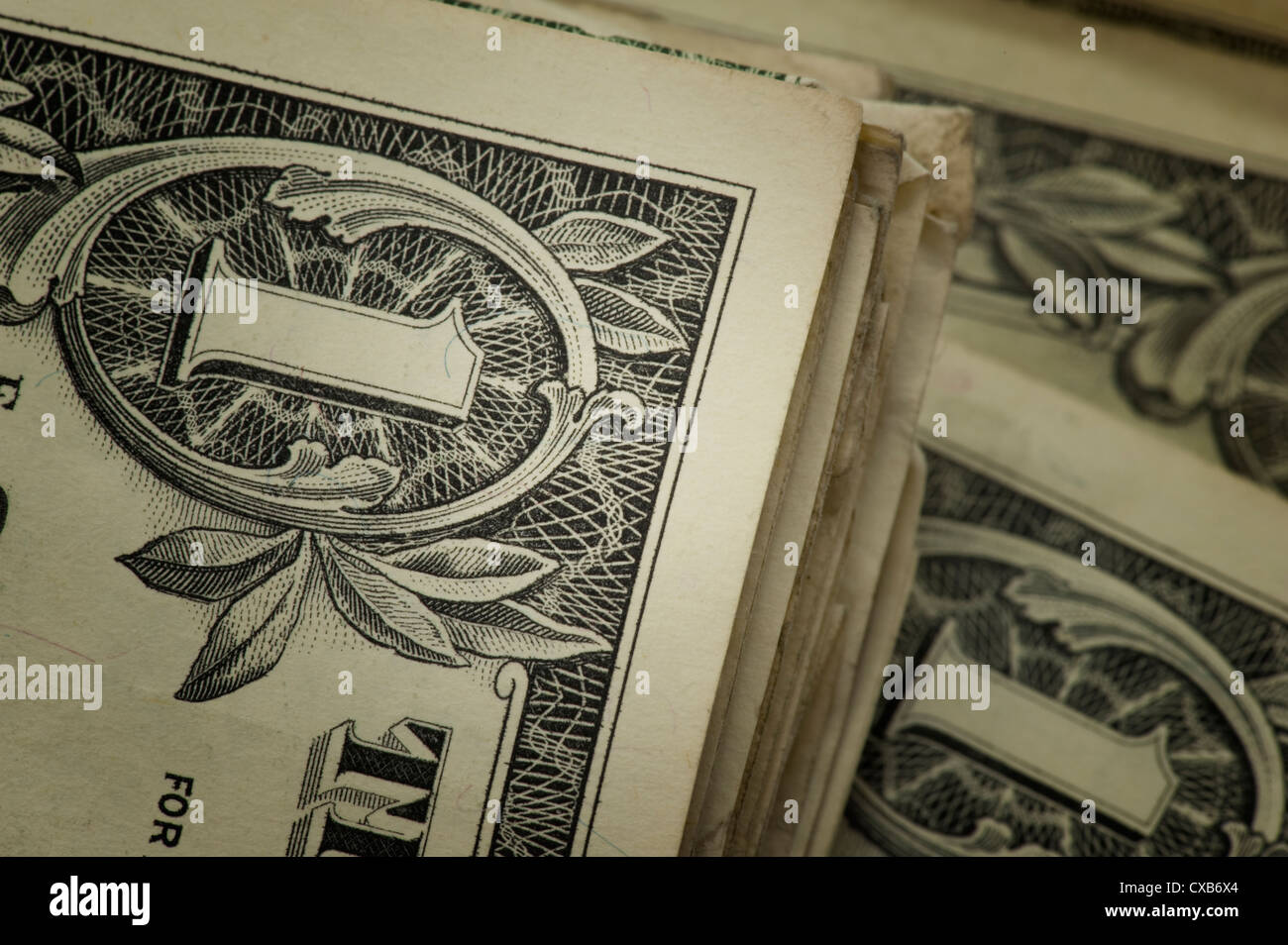 conceptual view of several one dollar bills US stacked together Stock Photo
