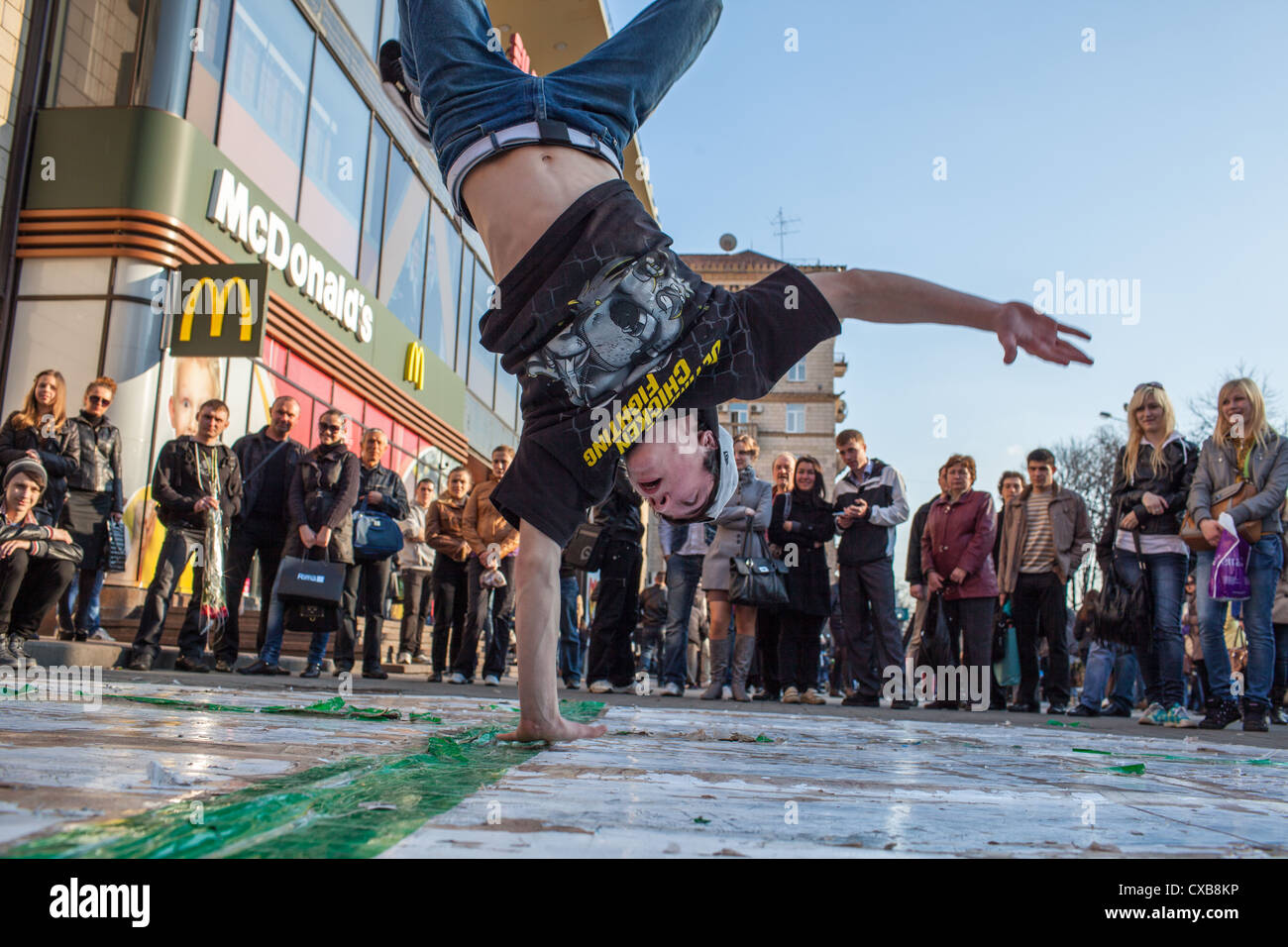 Break dance performer shows his dancing skills on Kreshchatyk in downtown Kiev, Ukraine, Eastern Europe. Stock Photo