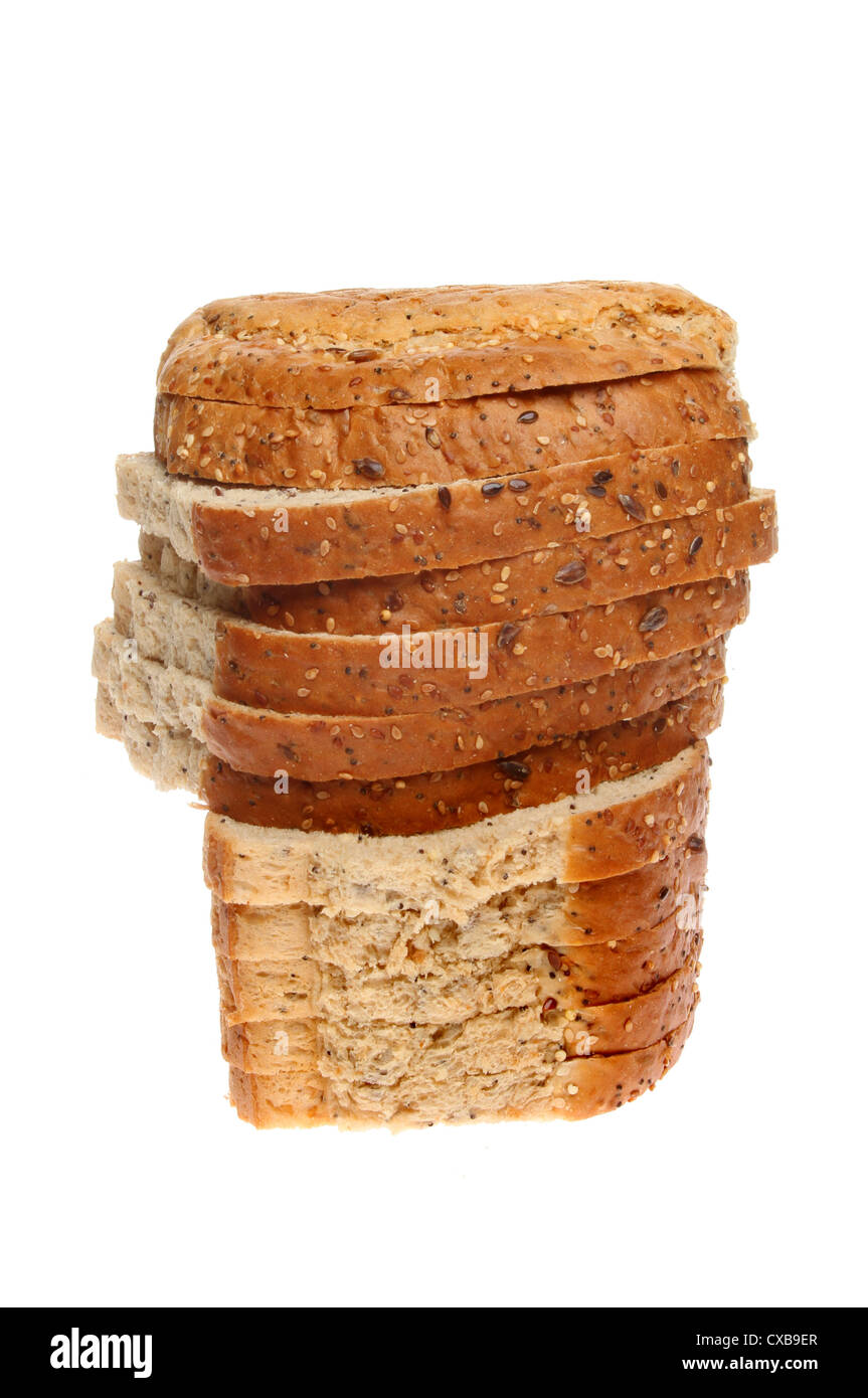 Stack of seeded wholemeal bread isolated against white Stock Photo