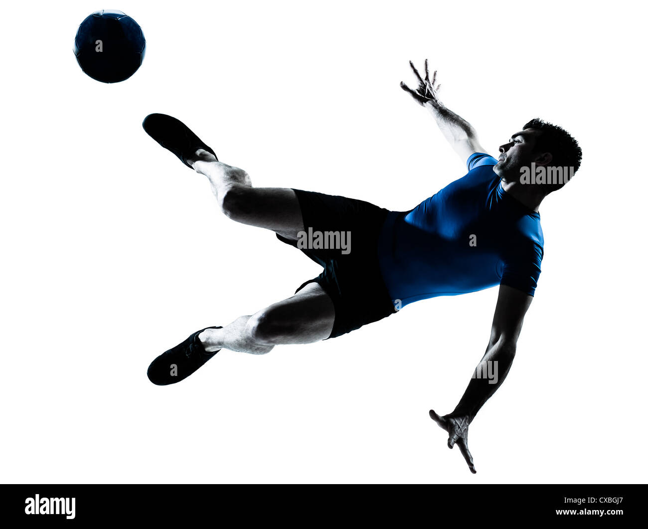 one caucasian man flying kicking playing soccer football player