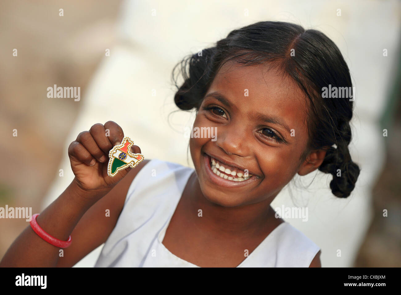 Indian school girl Dhanama with little India map pins Andhra Pradesh South India Stock Photo