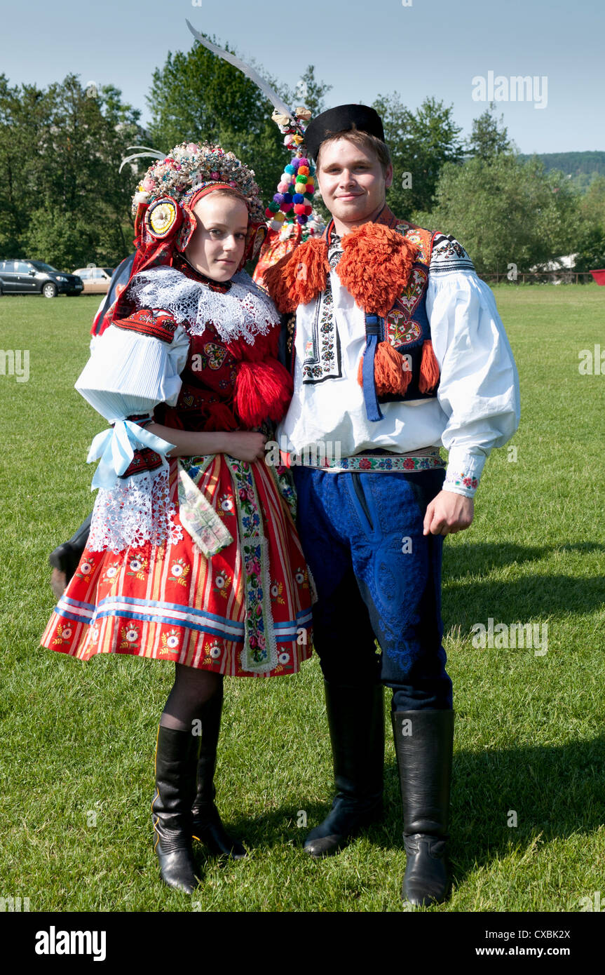 Woman and man dressed in folk dress during Ride of the Kings, village of Vlcnov, Zlinsko, Czech Republic, Europe Stock Photo