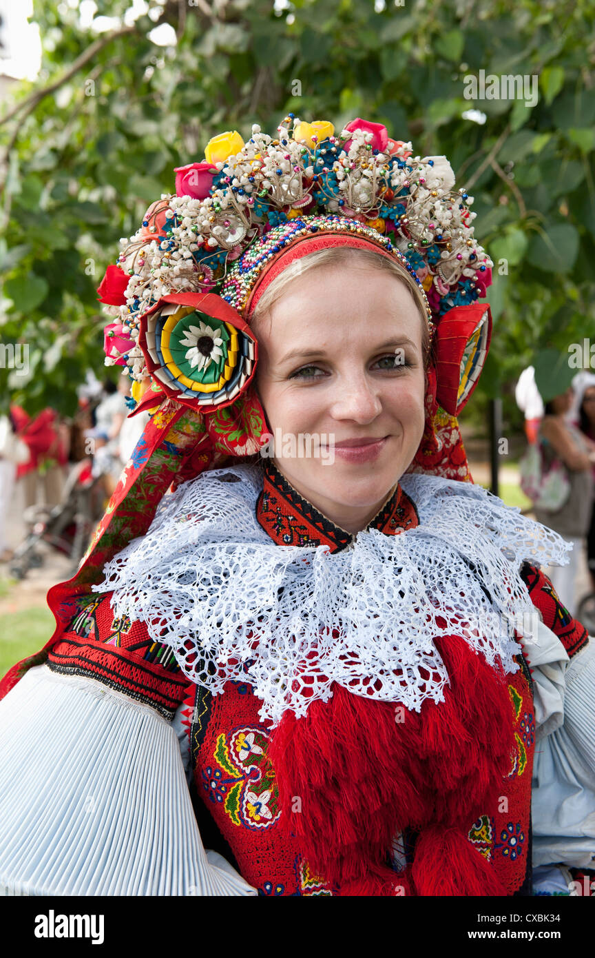Woman wearing Vlcnov folk dress during Ride of the Kings festival, Vlcnov, Zlinsko, Czech Republic, Europe Stock Photo
