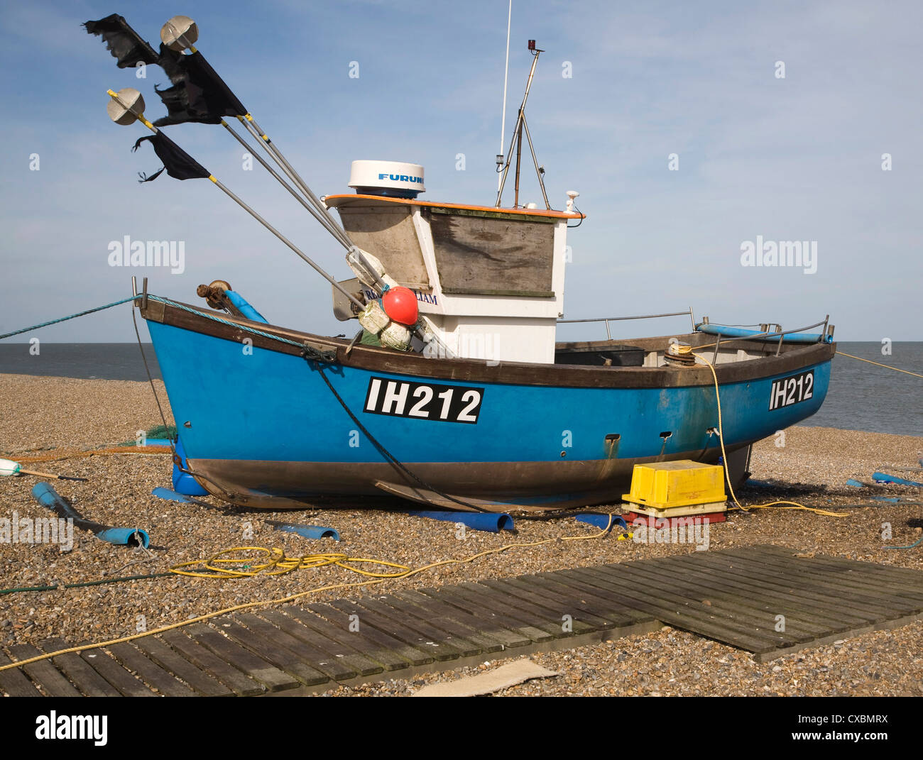 Blue fishing boat Aldeburgh beach Suffolk England Stock Photo