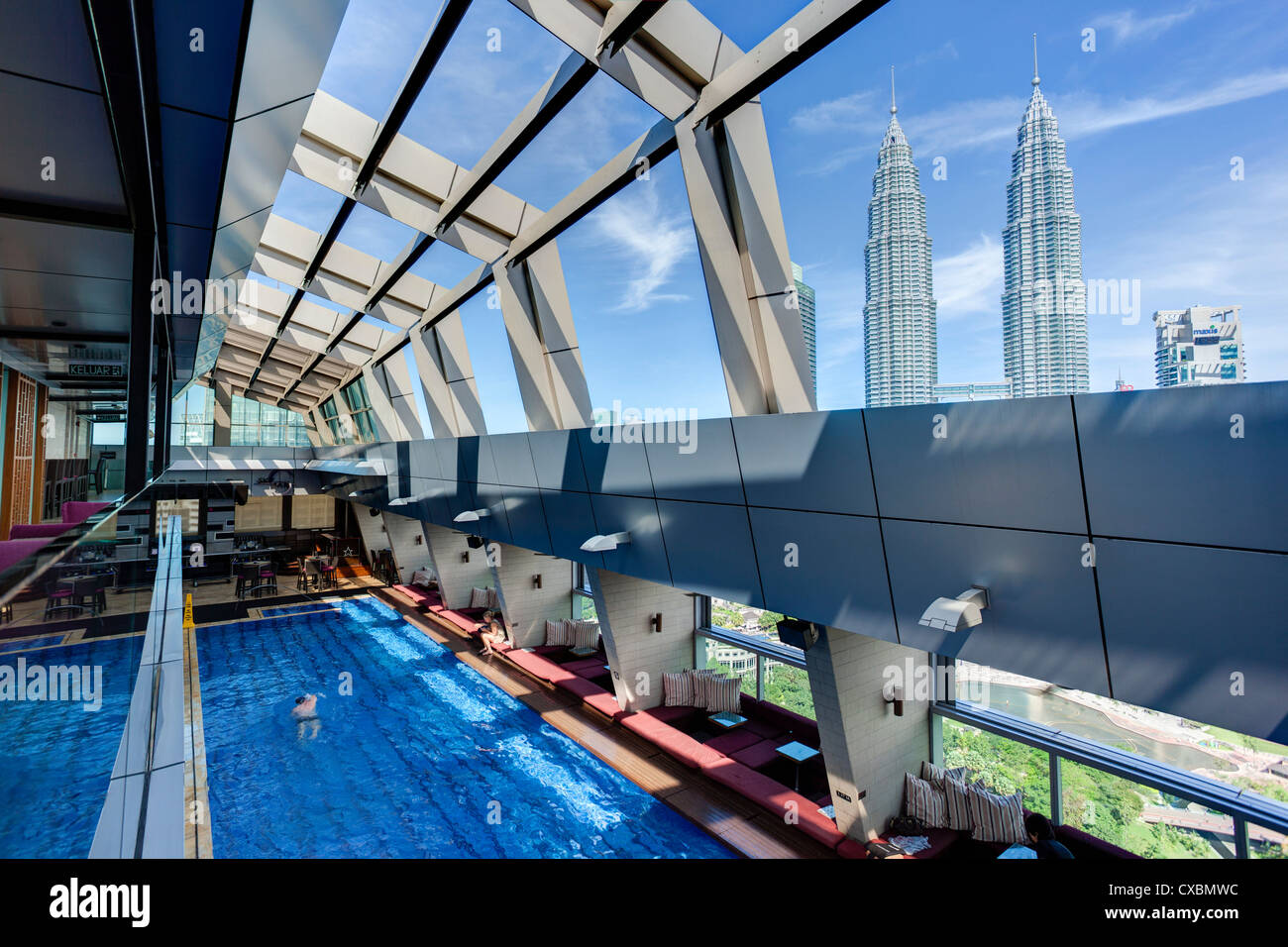 View from a rooftop pool and skybar of the iconic 88 Petronas Towers, Kuala Lumpur, Malaysia, Southeast Asia, Asia Stock Photo