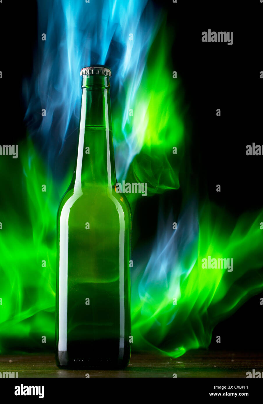 Beer bottle with color fire Stock Photo