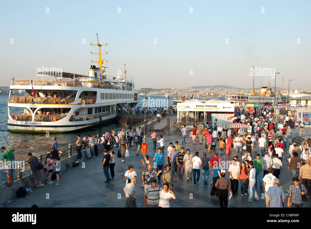ISTANBUL, TURKEY. A busy, colourful scene at Eminonu ferry terminal. 2012. Stock Photo