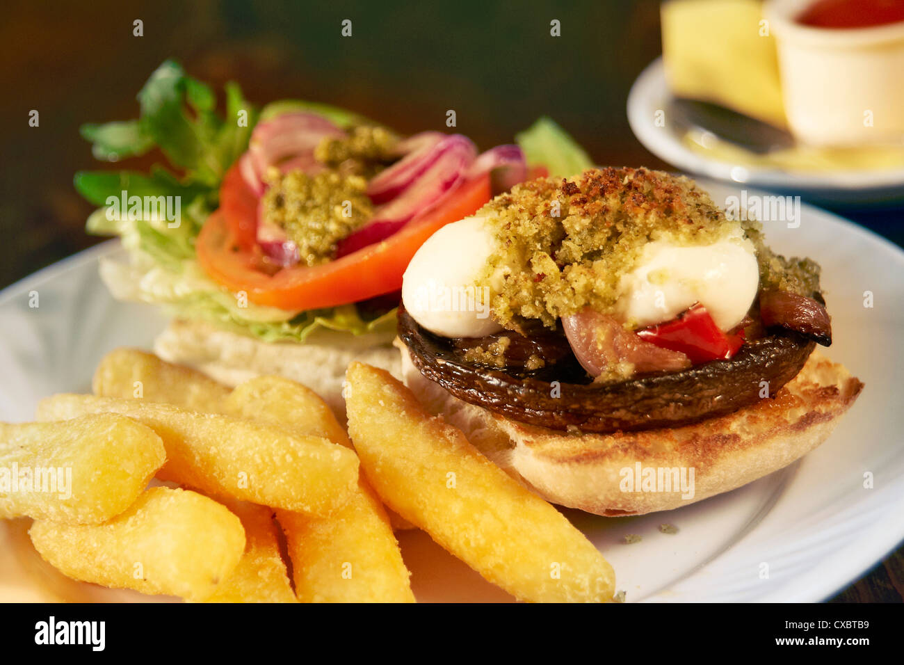 portobello mushroom burger with salad and chips Stock Photo Alamy