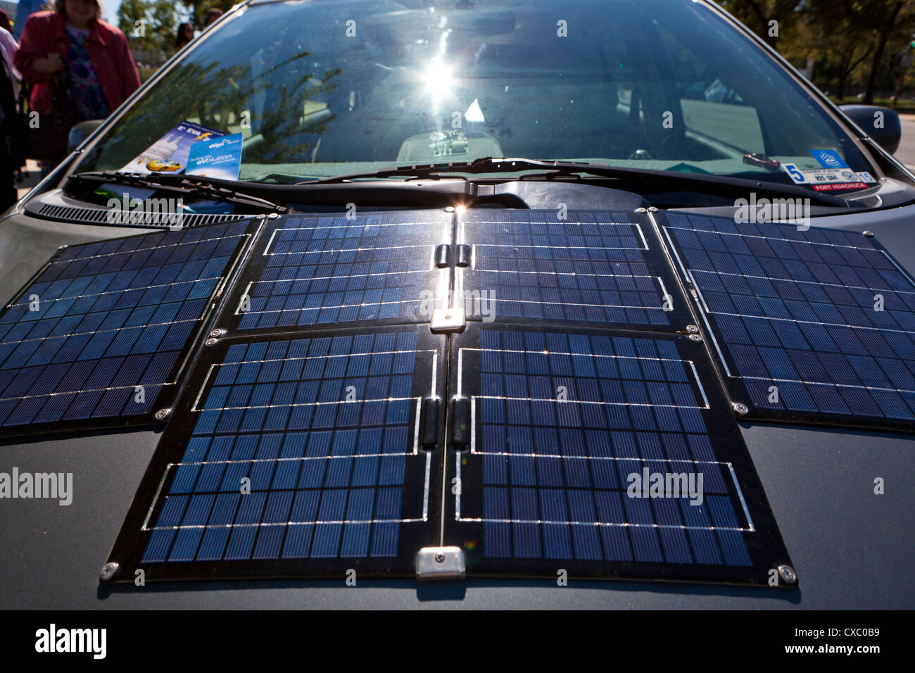 Solar cells installed on electric car hood Stock Photo