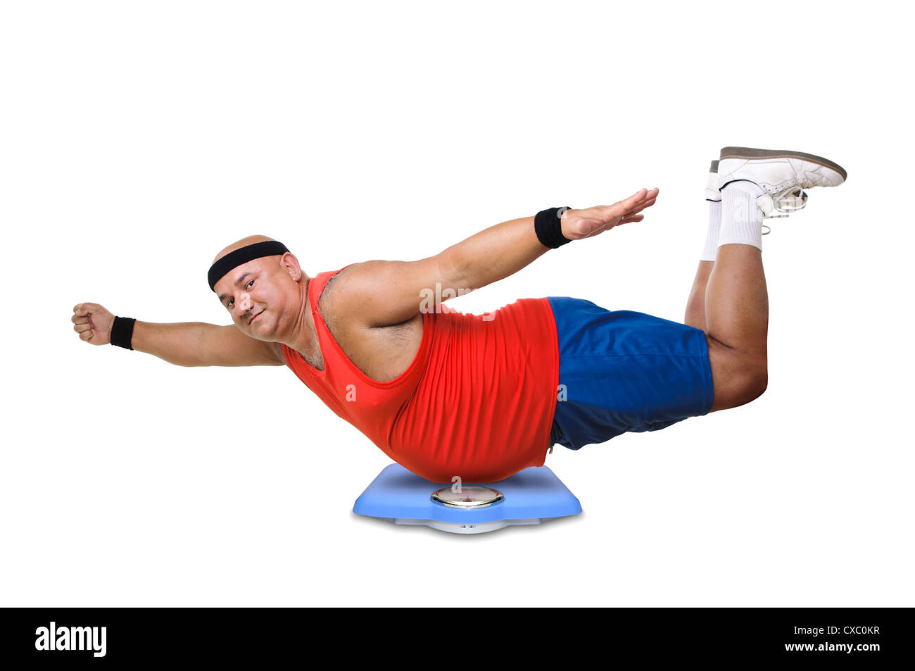 Large fitness man with a weight scale Stock Photo