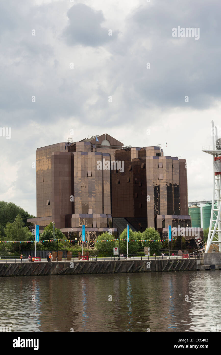 The rear, primarily glass, facade of the 'Quay West Building' on Salford Quays, Salford. Stock Photo