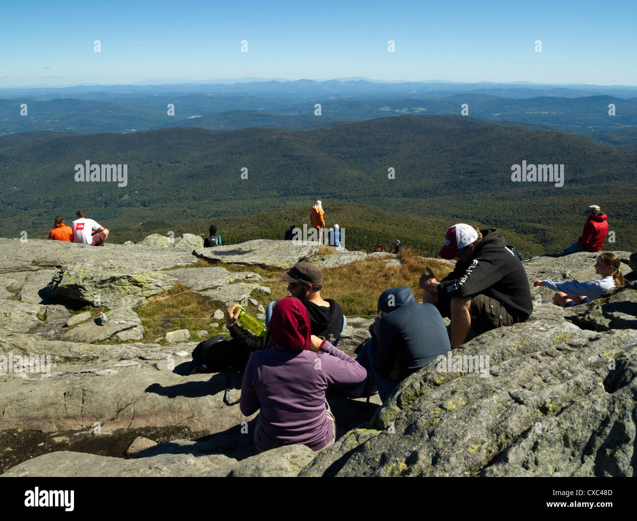 Summit of Camel's Hump with hikers, Vermont, USA Stock Photo