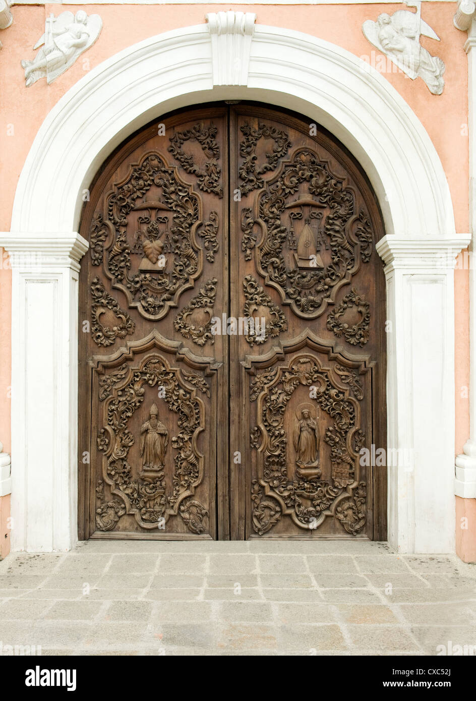 Door of San Augustin church, the oldest church in Manila dating from 1607, which survived American bombing, Philippines Stock Photo